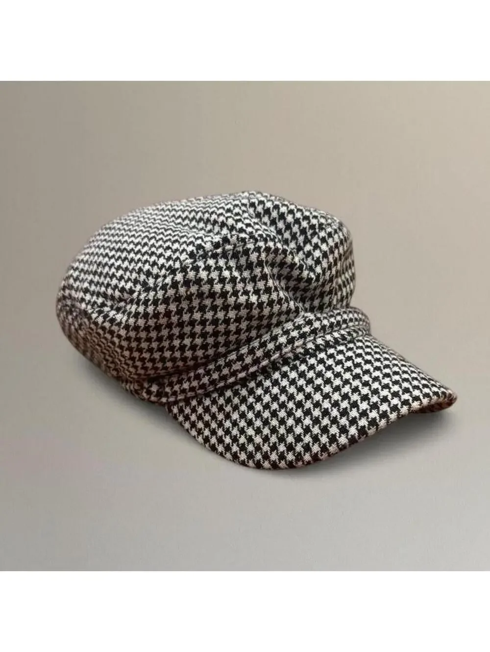Houndstooth newsboy cap.
